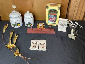 lot 183 image: Home Decor inc. 2 John Deere Canisters, Bear Hook, Eagle Figurine, 1997 Budweiser Holiday Stein and More