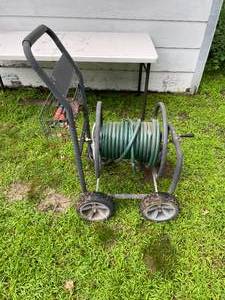lot 134 image: Water Hose w Rolling Caddy Reel Cart