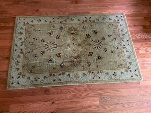 lot 142 image: Earth Tone Rectangular Area Rug w Floral Design