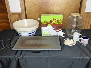 lot 171 image: Lot of Kitchen Items Including a Griddle, 2 Piece Salad Bowl Set, Themed Mugs, etc.