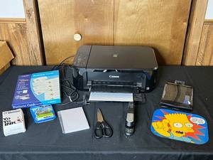 lot 177 image: Canon Printer, Business Cards, Themed Mousepad, Ink, Stapler, Scissors