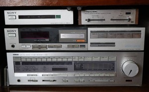 lot 351 image: (4) Vintage ComponentsYamaha R-100 Natural Sound Stereo AMFM Receiver, Sony Audio Signal Processor TA-AX44 Integrated Stereo Amplifier, Realistic Bass Enhancer Subsonic Filter 42-2106, Sony RM-44 Remote Control Commander System...