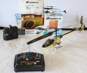 lot 400 image: Syma CollectorsHobbyists...Ed Hardy Skyhawk RC Helicopter Storm-lll and Mini Storm-lll...