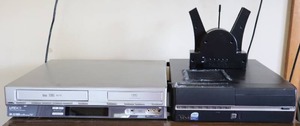 lot 468 image: LiteOn LVC-9016 DVDVCR Combo Recorder, MSI Hetis 915 Lite Slim Barebone, TDE Systems Programmable Red LED Message Clock Floating Message...