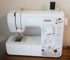 lot 450 image: Brother Sewing Machine, Electric Pedal and Manual Included