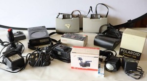 lot 592 image: Vintage Camera and Accessories...Polaroid Land Camera, Flash Gun, Sony D-50 Discman CD Player, Halogen AC-Powered CameraCamcorder Lights