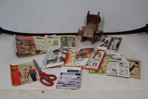 lot 675 image: Vintage Sewing pin Cushion Rocking Chair, Patterns, Books Etc