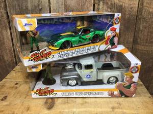 lot 165 image: 2 JADA Street Fighter 1956 Ford - 1969 Corvette - Die Cast