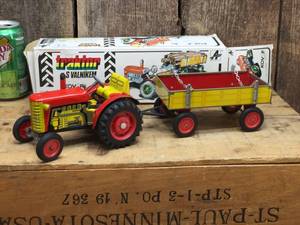 lot 195 image: Tin Zetor Tractor and Trailer Wind-Up Toy with Box
