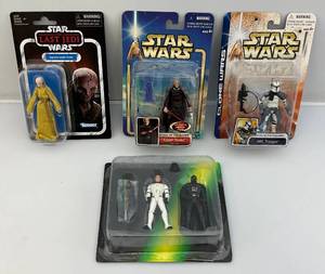 lot 54 image: Misc. Vintage STAR WARS Action Figures (NIB)