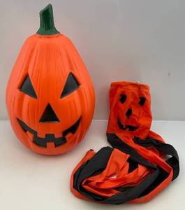 lot 132 image: Vintage 22 Pumpkin Blow Mold & Windsock