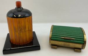 lot 217 image: Two Vintage Art Deco Cigarette Holders 1 Bakelite Has Cracks In Bakelite 1 Roll Top Both Very Cool
