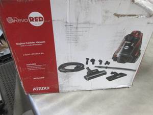 lot 84 image: Atrix Revo Red Bagless HEPA 120V Ca...