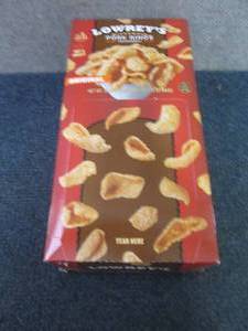 lot 334 image: 18- 1.75 oz Lowreys Pork Rinds...