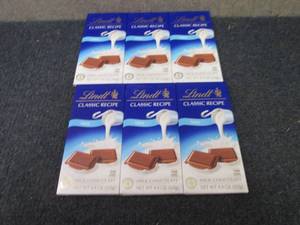 lot 357 image: 6- 4.4 oz Lindt Milk Chocolate...