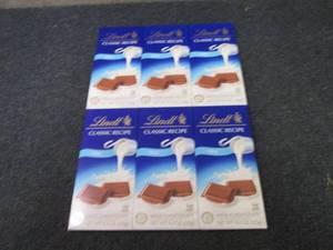 lot 362 image: 6- 4.4 oz Lindt Milk Chocolate...