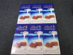 lot 363 image: 6- 4.4 oz Lindt Milk Chocolate...