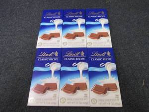 lot 372 image: 6- 4.4 oz Lindt Milk Chocolate...