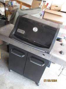 Weber Rolling gas grill with propan...