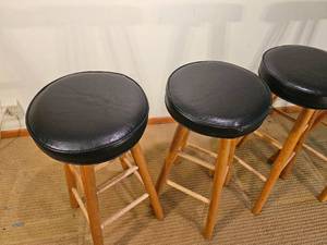 lot 35 image: Vintage Black Cushion Barstools