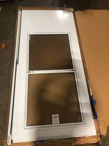 lot 9 image: EMCO 100 Series Plus 36 in. x 80 in. White Universal Self-Storing Storm Door with Black Hardware  Customer Returns See Pictures