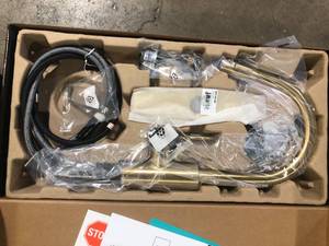 lot 19 image: KRAUS Oletto Single-Handle Pull-Down Kitchen Faucet with Dual-Function Sprayer in Brushed Brass Customer Returns See Pictures