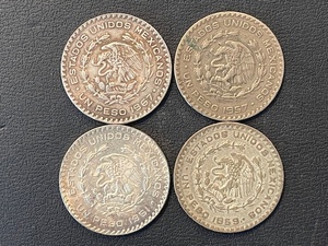 Un Peso Silver Coins