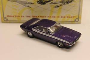 lot 29 image: Vintage Die-Cast Purple Challenger Model Car with Box