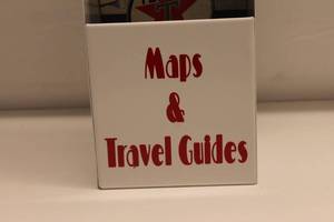 lot 96 image: Texaco Maps and Travel Guides Display with Vintage Miami Map