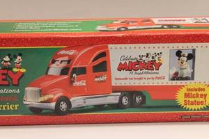 lot 113 image: Celebrate Mickey 75 InsPEARations 2004 Tour Carrier with Mickey Statue