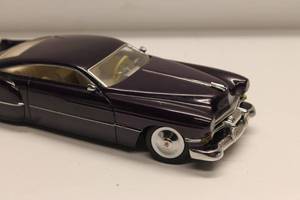 lot 126 image: Detailed 118 Scale Custom Die-Cast Model Car - Metallic Purple