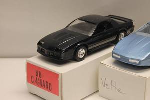 lot 156 image: Lot of 4 Die-Cast Model Cars - 1986 Camaro, 1986 Corvette, 1991 Corvette Convertible