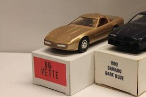 lot 177 image: Lot of 7 Diecast 124 Scale Model Cars - Corvette & Camaro Collection