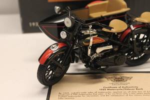 lot 184 image: Limited Edition 1933 Harley-Davidson MotorcycleSidecar Die-Cast Bank with Certificate of Authenticity