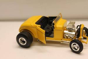 lot 209 image: Collectible Die-Cast Yellow Hot Rod Model Car