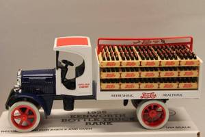 lot 266 image: Vintage Ertl Diecast Coin Banks  1950 Chevy Panel and 1925 Kenworth Bottle Truck