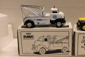lot 287 image: Lot of 2 Diecast Models 1952 GMC Heavy Duty Wrecker & 1951 Ford F-6 Dry Goods Van