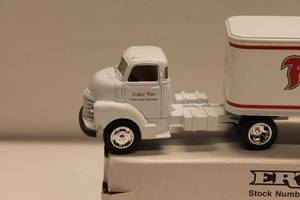 lot 290 image: Ertl Diecast Firestone Vintage Tires Truck Bank - Stock Number B217UO