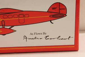 lot 324 image: Vintage Eastwood Automobilia Lockheed Vega Model Airplane Coin Bank