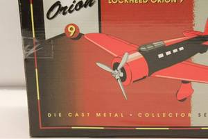 lot 326 image: Lockheed Orion 9 Die Cast Metal Collector Series Bank