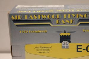 lot 332 image: Air Eastwood Flying Service Bank - 1932 Lockheed Vega Model 5C