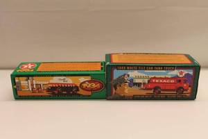 lot 337 image: Texaco Vintage Die-Cast Locking Coin Banks Lot  1934 Diamond T Tanker & 1949 White Tilt Cab Tank Truck