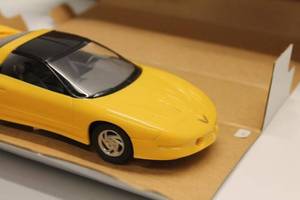 lot 349 image: Yellow Diecast Model Car - Pontiac Firebird Replica