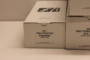 lot 380 image: Lot of 9 ERTL 125 Scale Diecast Models