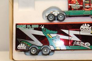 lot 412 image: Mac Tools Gatornationals March 19, 2000 Limited Edition Die-Cast Truck Set
