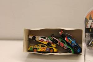 lot 427 image: Assorted NASCAR Collectible Die-Cast Cars and Memorabilia Lot