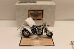 lot 259 image: 1957 Harley-Davidson Police Servi-Car Bank