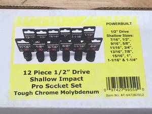 lot 18 image: Powerbuilt 12 Piece 12 inch drive shallow impact socket set