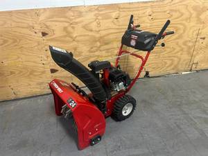 lot 78 image: TROY-BILT Storm 24 in. 208 cc Two- Stage Gas Snow Blower with Electric Start Self Propelled