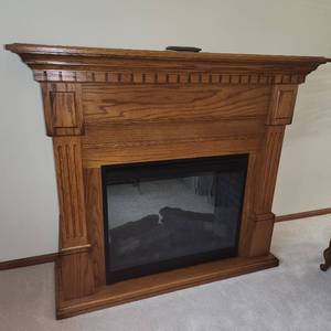 Electric Fireplace Measuring 55 Inches Wide x  18 Inches Deep x  and 48 Inches Tall.  Includes Remote.  Tested and Works.